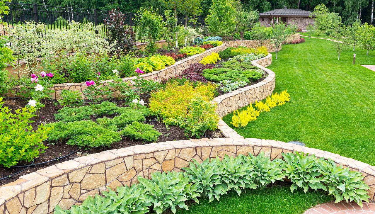 Landscaped front yard with retaining wall
